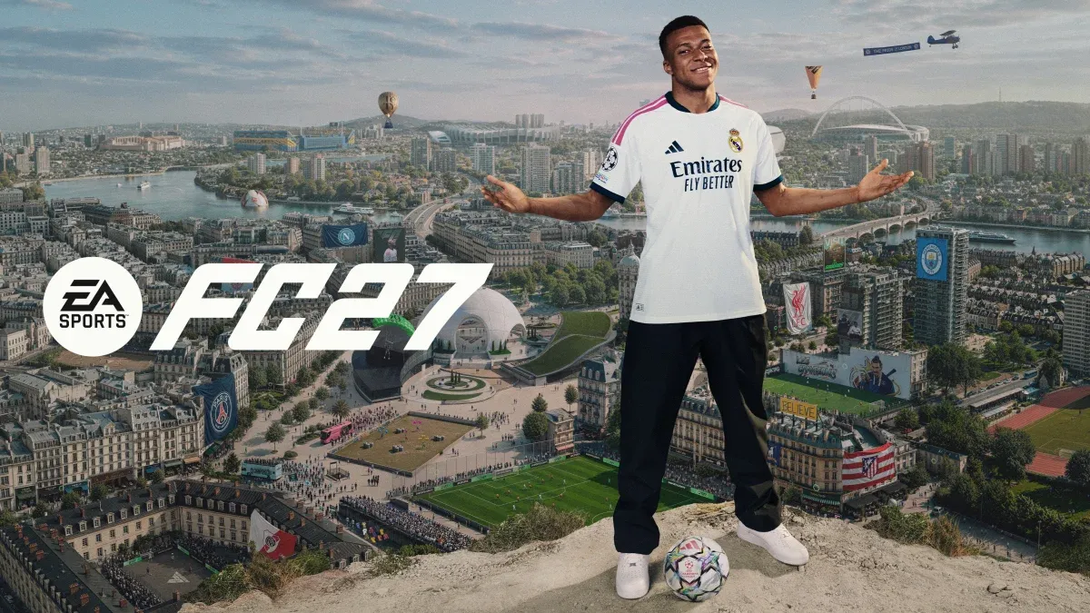 A football player in a Real Madrid jersey stands atop a cliff overlooking a cityscape with soccer fields, balloons, and the EA SPORTS FC27 logo.