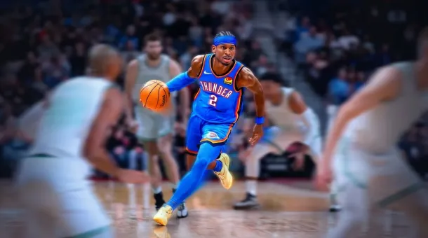 A basketball player in a blue Thunder jersey dribbles the ball during a game, with opponents and a crowd in the background.