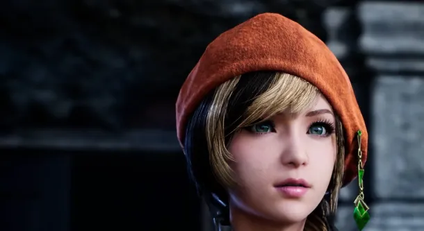 A character with blonde hair and a red beret, wearing a detailed outfit with green earrings, stands before a stone wall.
